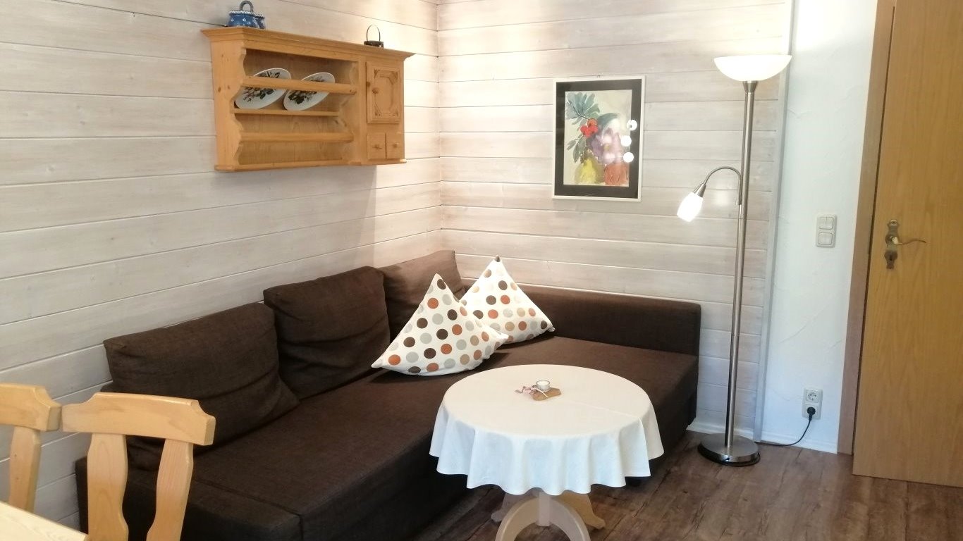 Die gemütliche Couchecke in der Ferienwohnung Trettachspitze